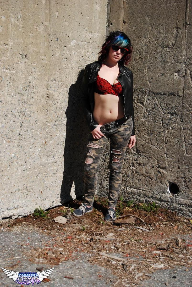 12P Horny tease Sabrina shows off her round ass outdoors as she pulls down her pants