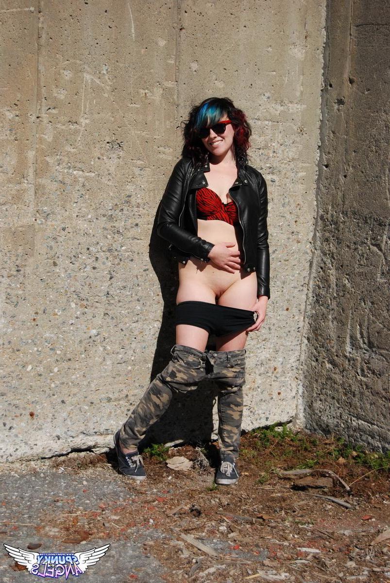 12P Horny tease Sabrina shows off her round ass outdoors as she pulls down her pants