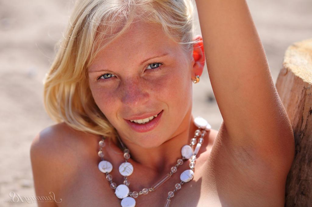 16P Beautiful blonde teen Olga W shows you her tight pussy on the beach in "Scaffold"