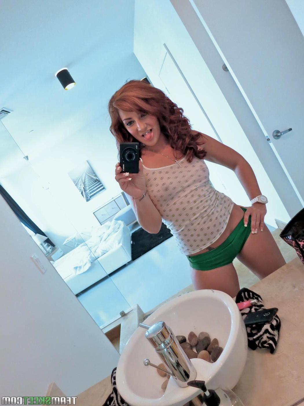 16P Hot redhead Savanah Fox takes pics of herself and then gets fucked hard doggystyle