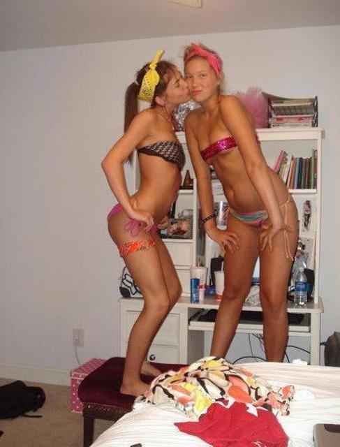 15P Pictures of two hot coeds getting naughty in the bedroom