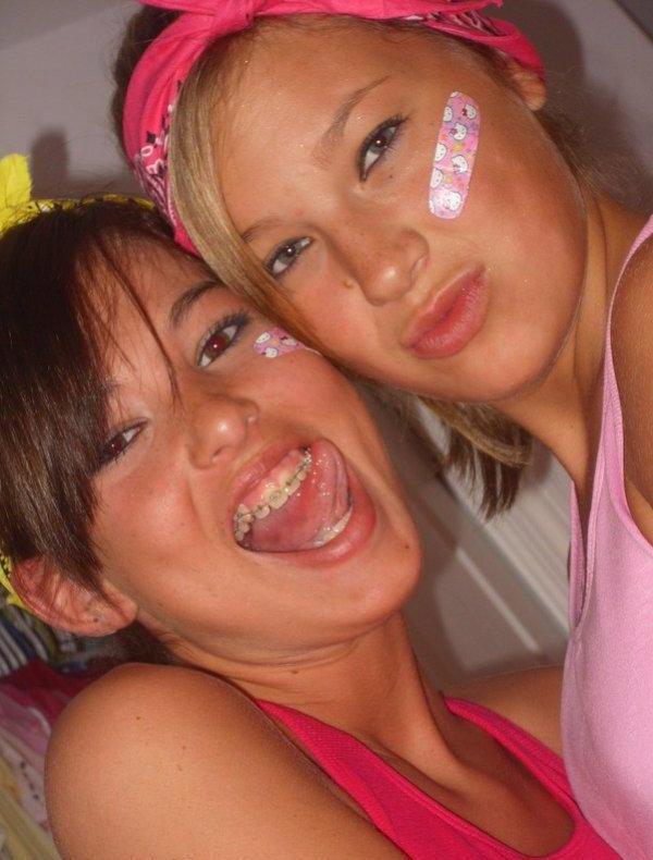 15P Pictures of two hot coeds getting naughty in the bedroom
