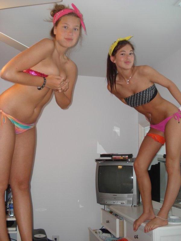 15P Pictures of two hot coeds getting naughty in the bedroom