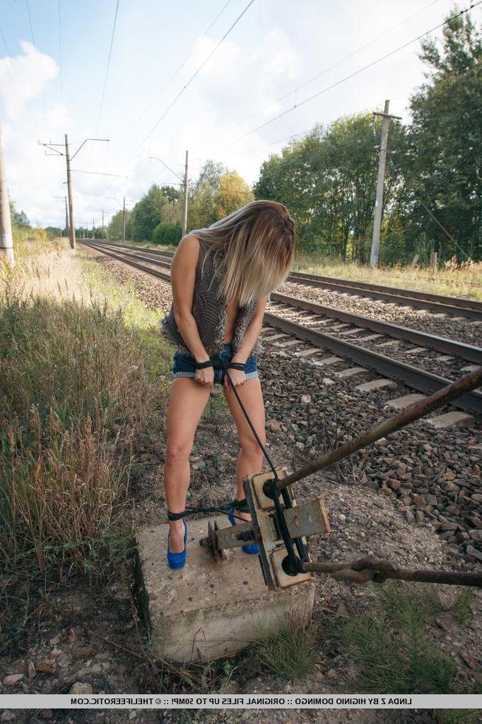 16P Blonde teen Linda Z gets kinky outside on the train tracks