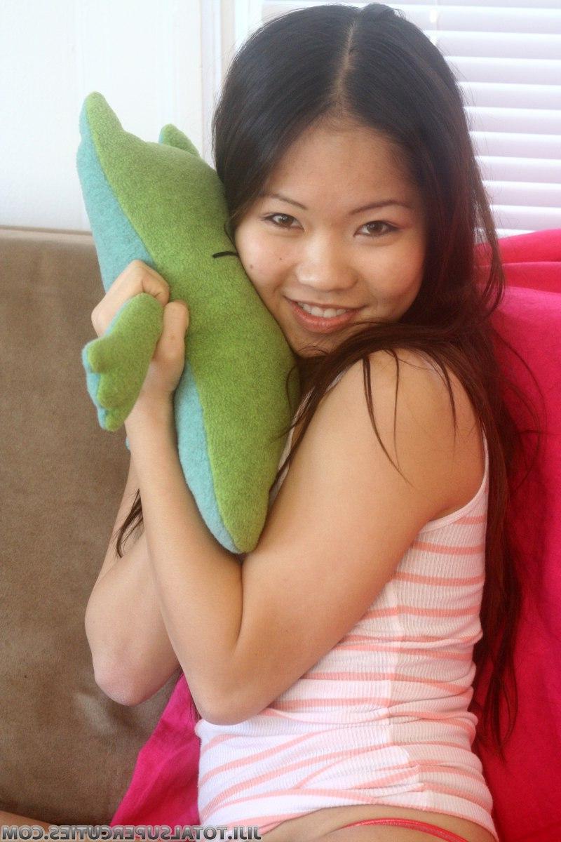 20P Pictures of a cute asian teen stripping to her panties