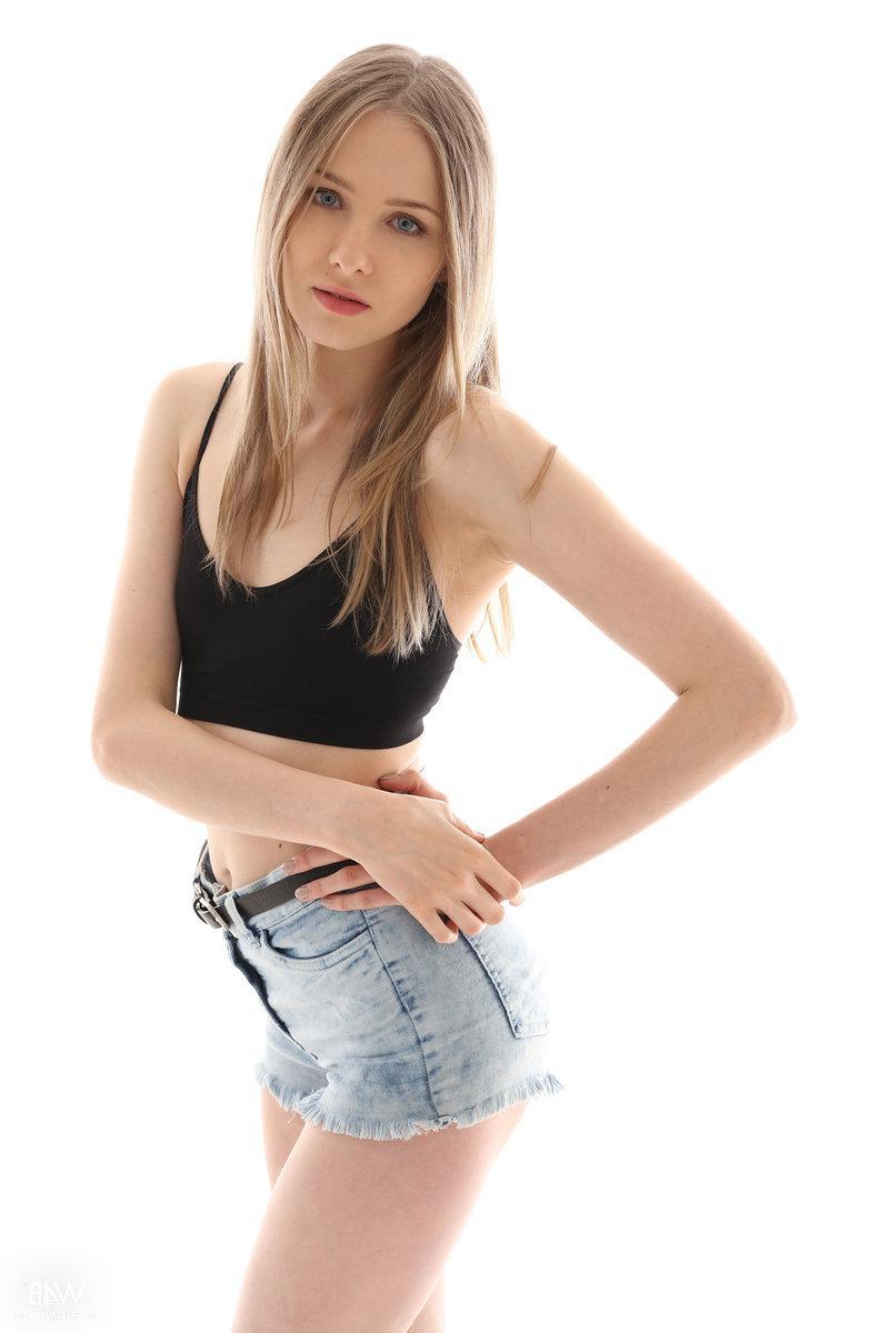 16P Blonde teen Elfia strips nude for you in her casting set