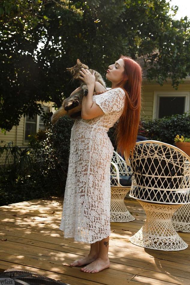 8P Redhead hottie Gina Rosini shows you how gorgeous she looks in a white dress