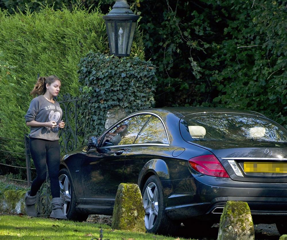 15P Kelly Brook showing off her ASS outside her home 