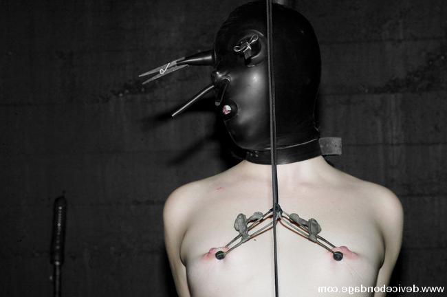 15P Masked Alyssa on ultra high heels in leather strap bondage