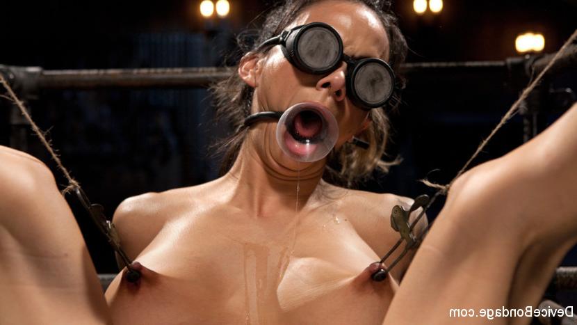 15P Big titted Nadia Styles submits to Orlando and his brutal bondage box. She is co