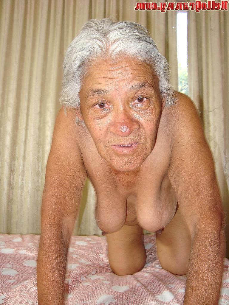 16P Sexy and hot grandmother posing in bed