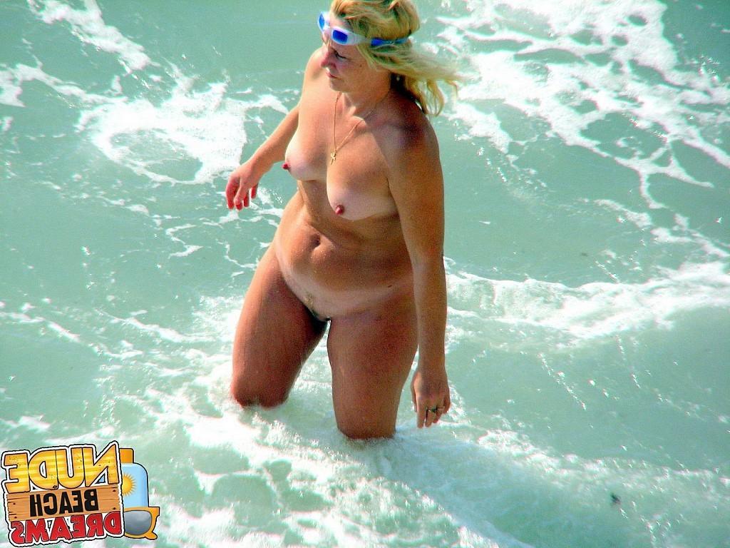 15P Totally naked women shows off and having fun under the sun