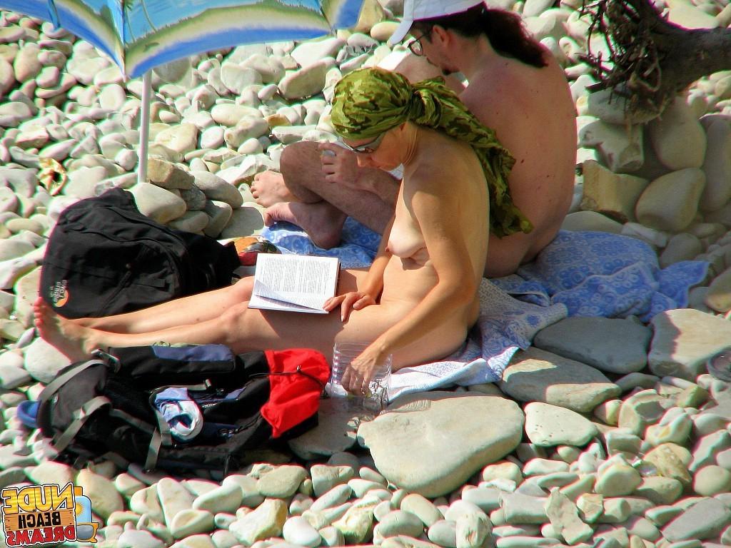 15P Totally naked women shows off and having fun under the sun