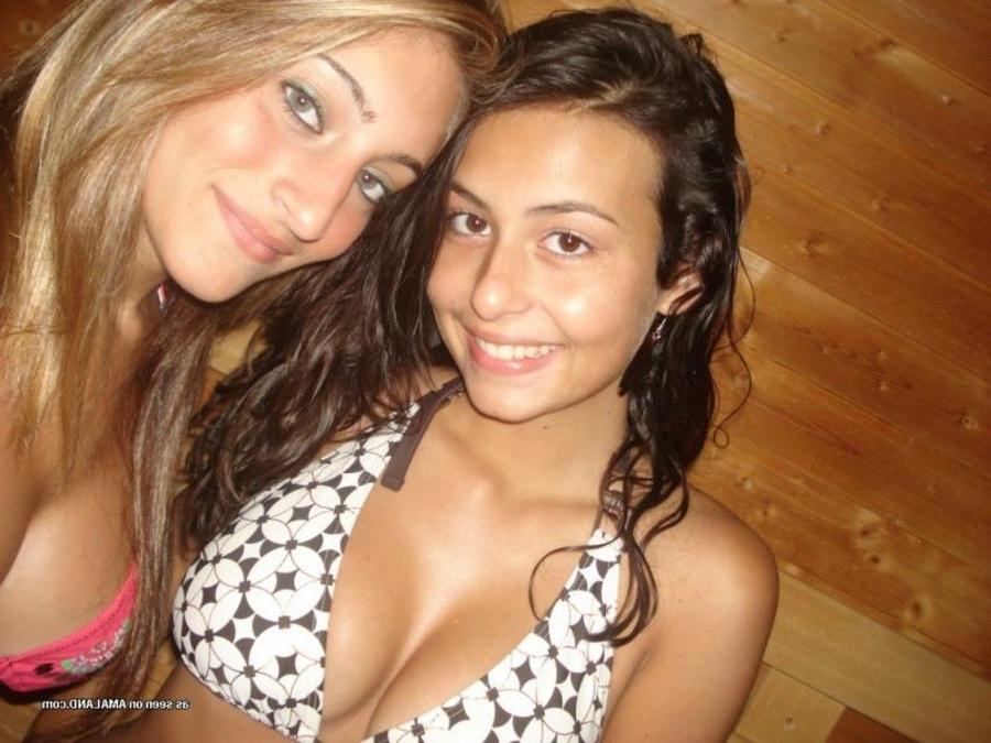 9P Photos of two amateur sexy teen lesbo lovers posing