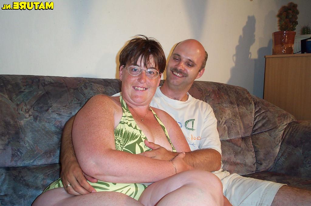 15P Mature couple having sex on their scruffy couch