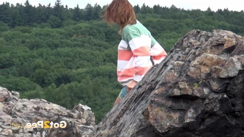 15P A girl is taking in the view when she needs to pee