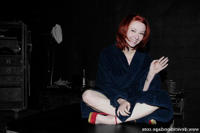 15P Redhead girl fixed in strap bondage gaged and nipples stretched