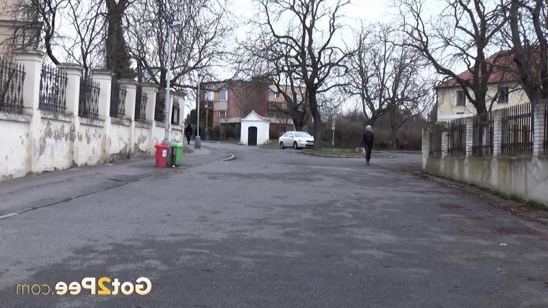 15P A pretty blonde pulls down her trousers to pee