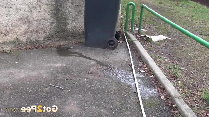 15P A pretty blonde pulls down her trousers to pee