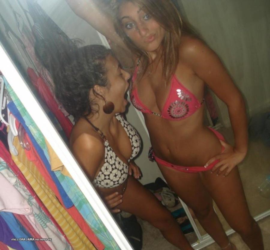 11P Photos of two amateur sexy teen lesbo lovers posing