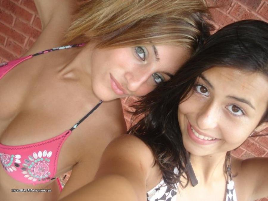 11P Photos of two amateur sexy teen lesbo lovers posing