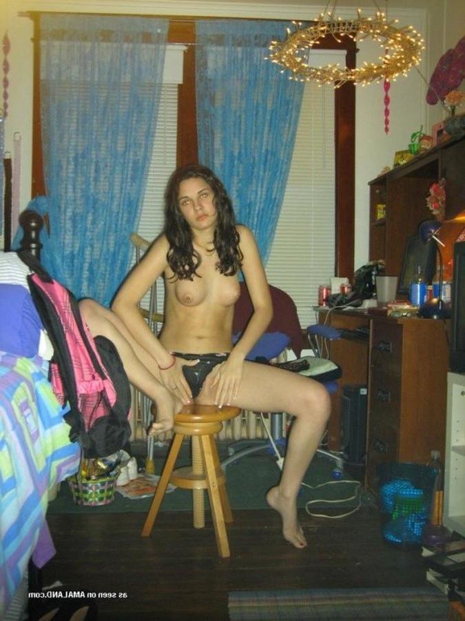 11P Hot brunette stripteasing in her messy bedroom