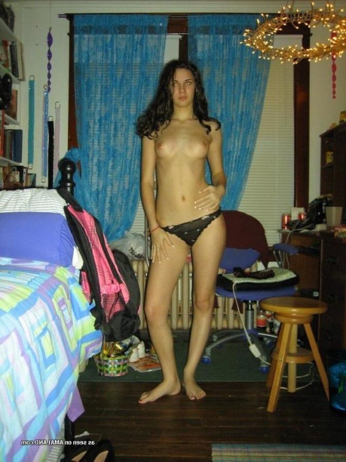 11P Hot brunette stripteasing in her messy bedroom