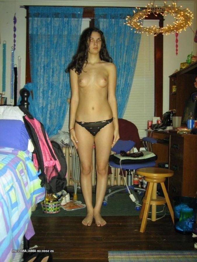 11P Hot brunette stripteasing in her messy bedroom