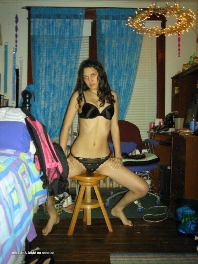 11P Hot brunette stripteasing in her messy bedroom