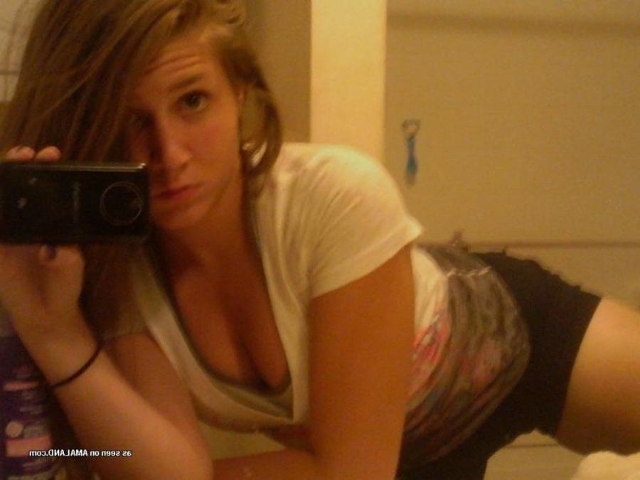 11P Amateur blonde chick teasing while camwhoring at home