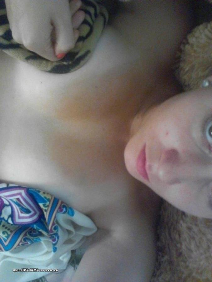 11P Amateur blonde chick teasing while camwhoring at home
