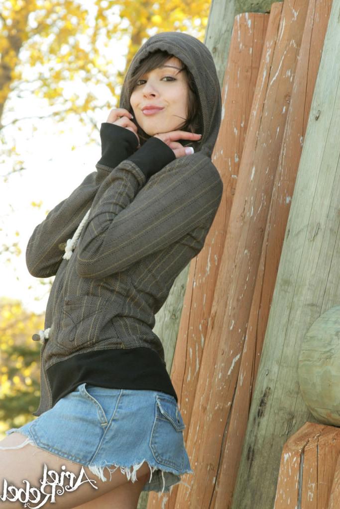 15P Ariel Rebel poses in the park