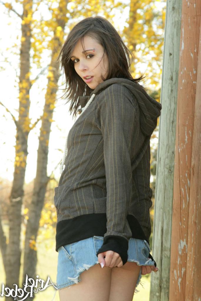 15P Ariel Rebel poses in the park