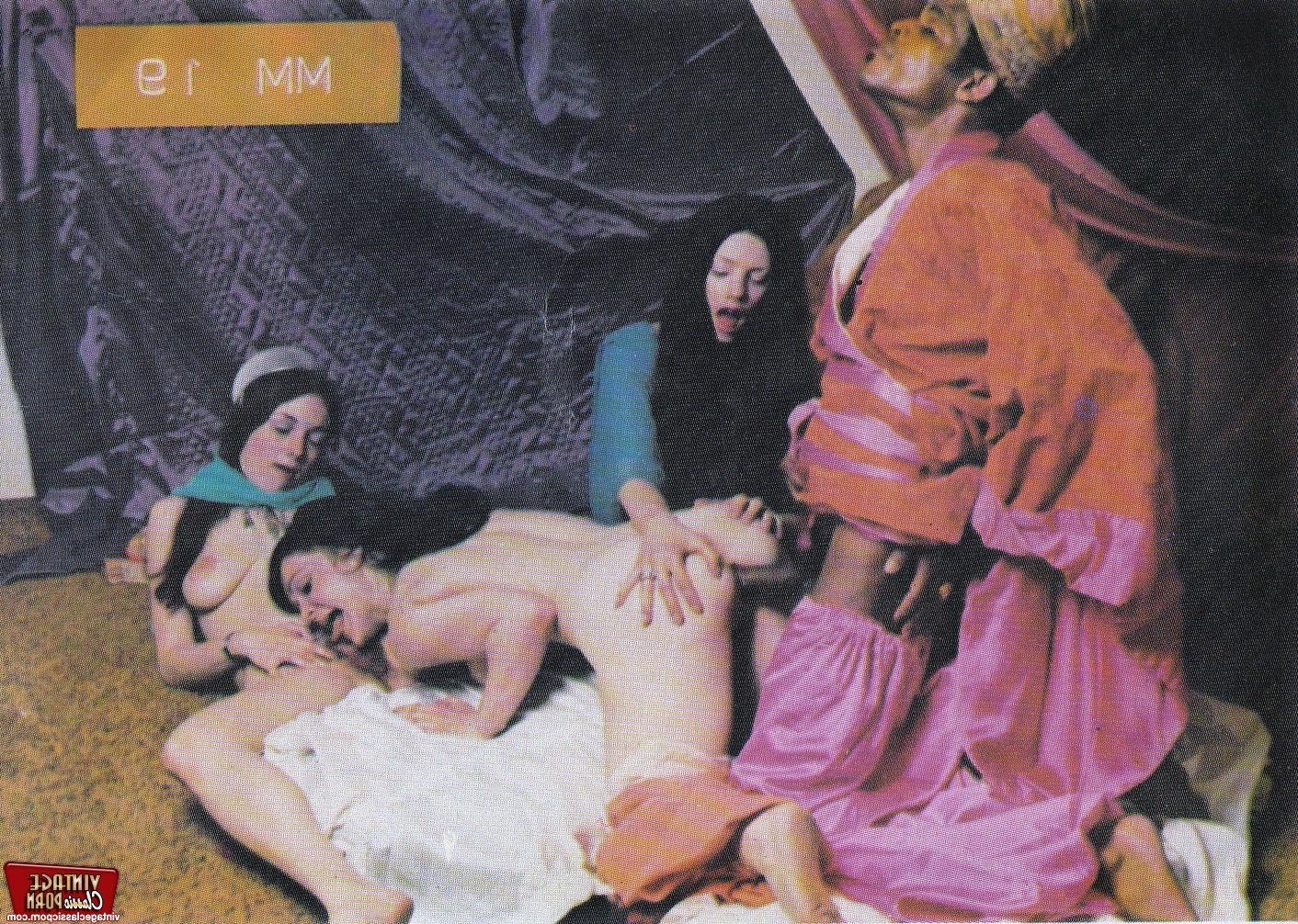 12P Several horny seventies couples enjoy to share a big cock