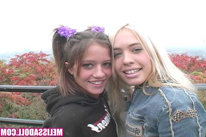 15P Hardcore teen lesbians screwing with a large strap-on dildo