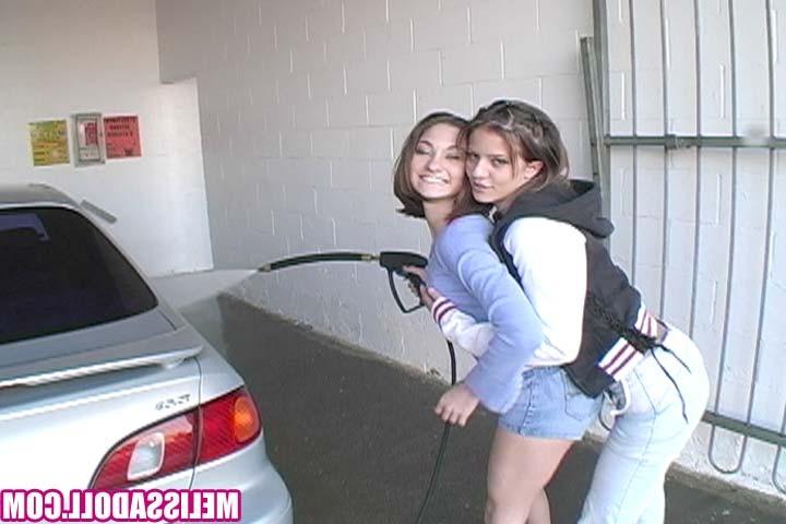 15P Two fabulous teen lesbians playing with a big strap-on dildo