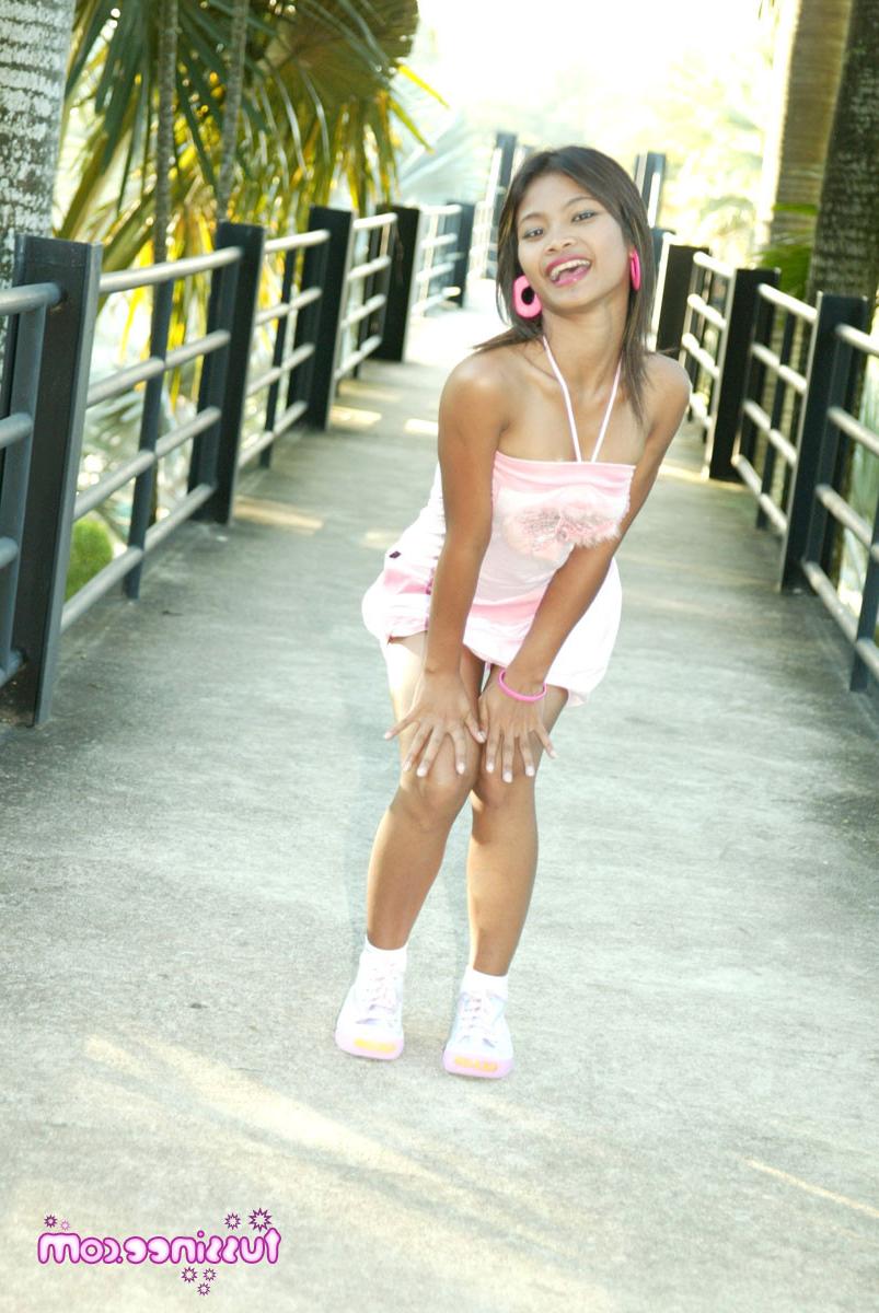15P Thai teen model Tussinee takes revealing photos at a famous park
