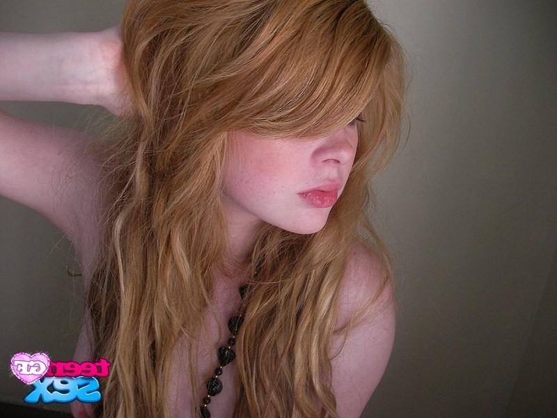 12P Amateur girlfriend with long hair on topless pics