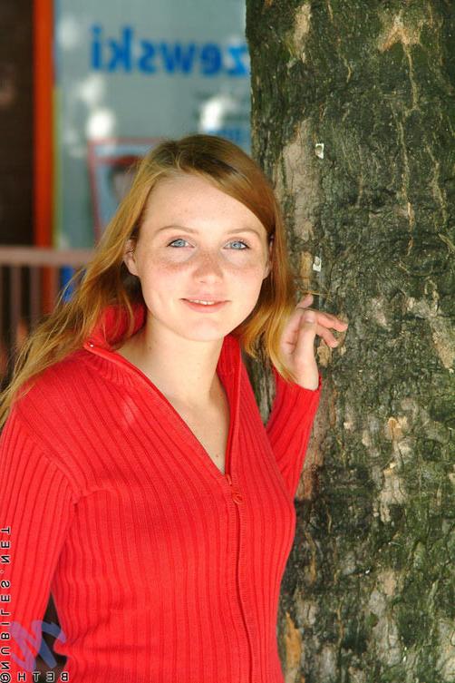15P Sexy teen beth walks thru the park and stops at a few shops just hanging out