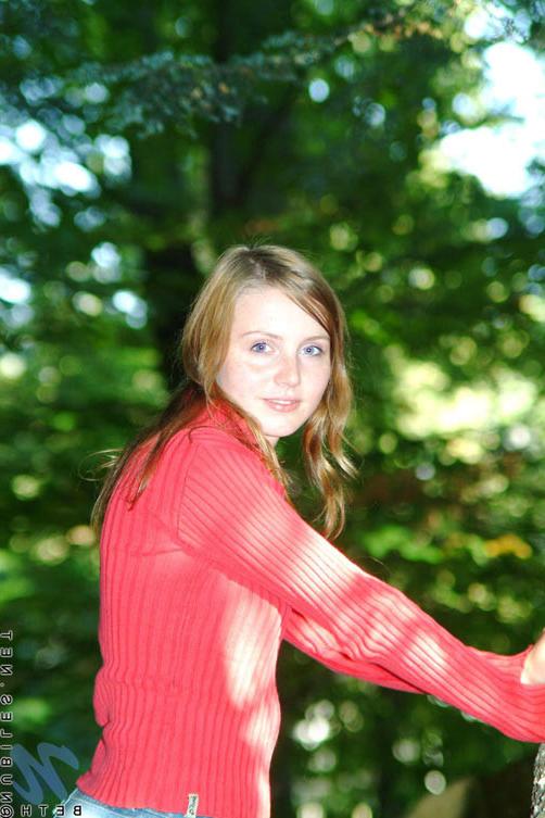 15P Sexy teen beth walks thru the park and stops at a few shops just hanging out