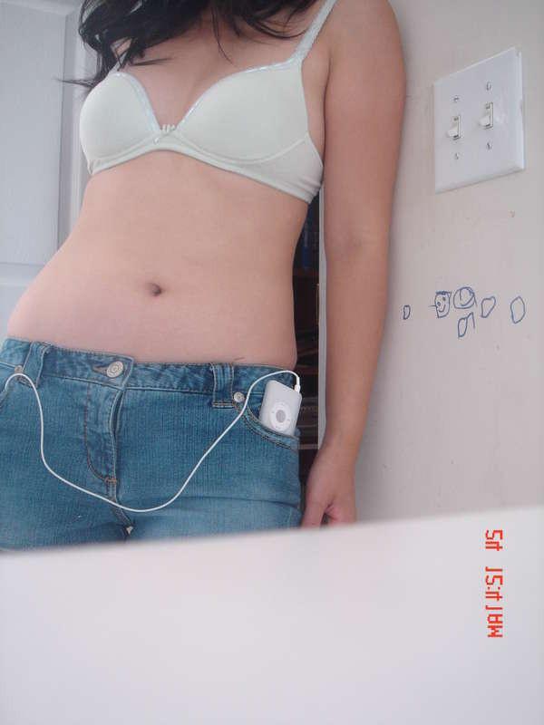 15P Photos of an Asian teen getting naughty in the bedroom