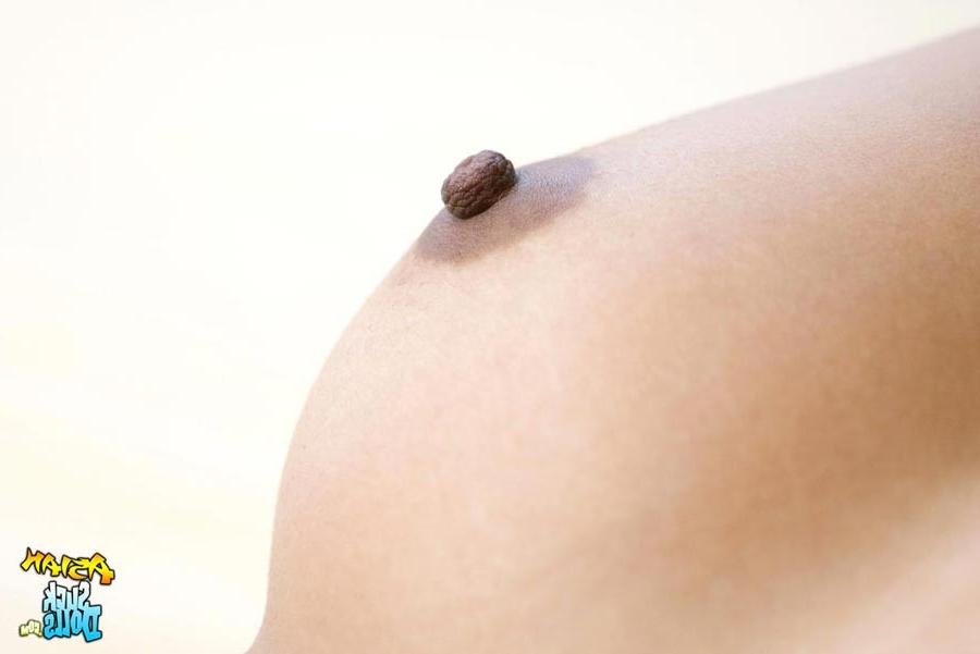 15P Beautiful hard dark nipples on this asian suck doll!