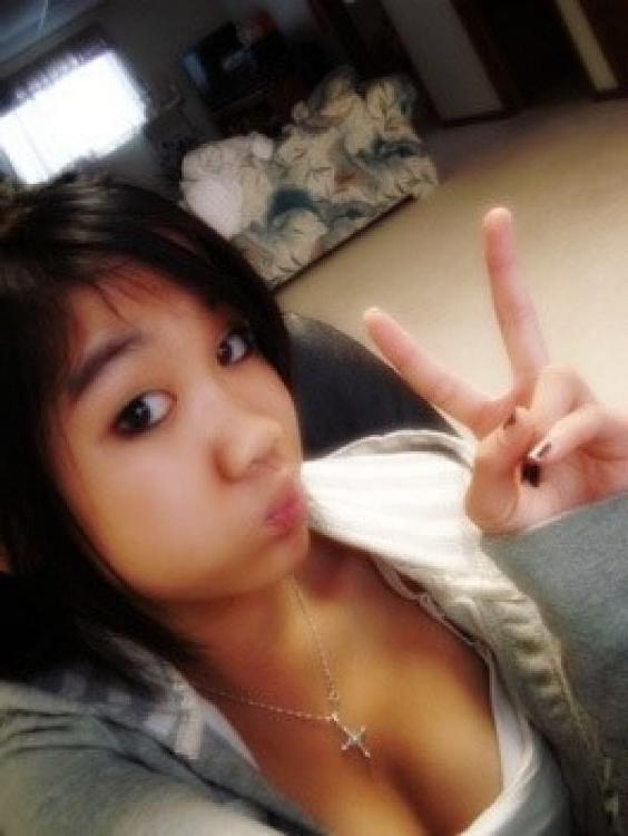 16P Asian coed goes full nude in couch shows squeezable tits