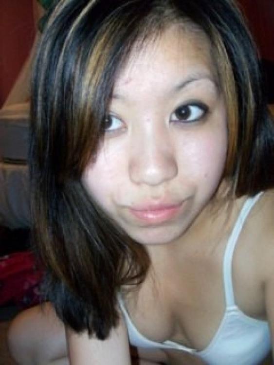 16P Asian coed goes full nude in couch shows squeezable tits
