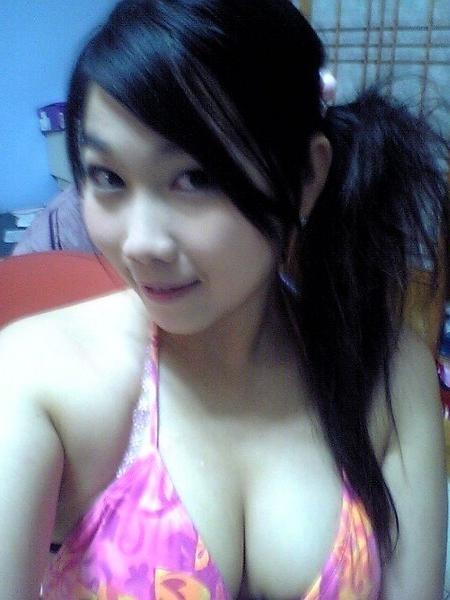 16P Asian does a stiptease befoe sliding her pussy on huge cock