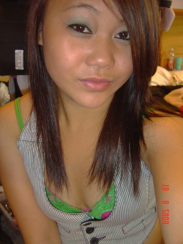 16P Asian coed goes full nude in couch shows squeezable tits