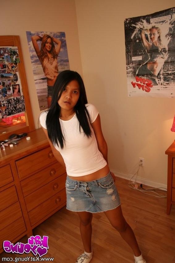 12P Kat has fun posing on her bedroom floor