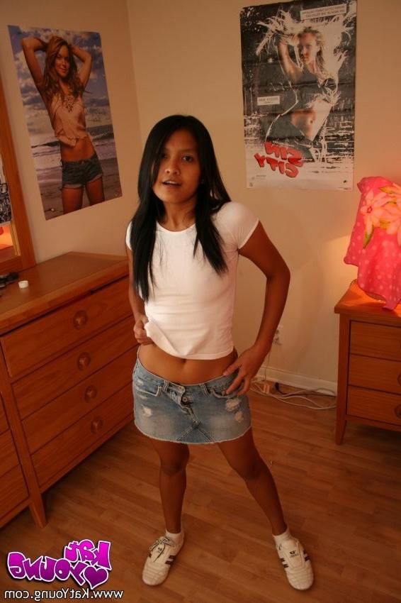 12P Kat has fun posing on her bedroom floor