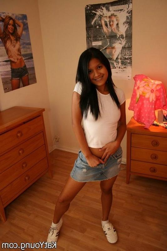 15P Kat is cute exotic thai undressing in her bedroom
