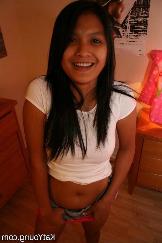 15P Kat is cute exotic thai undressing in her bedroom